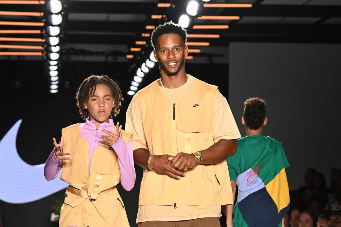 Victor Cruz and daughter Kennedy walk the runway for Nike during the 2022 Rookie USA Fashion Show at 608 Fifth Avenue on September 08, 2022 in New York City.