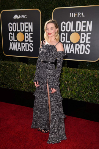 Margot Robbie arrives at the 78th Annual Golden Globe Awards at the Beverly Hilton in Beverly Hills, CA on Sunday, February 28, 2021.