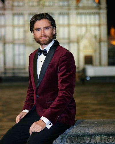 burgundy-velvet-tuxedo-jacket-with-black-tailored-trousers