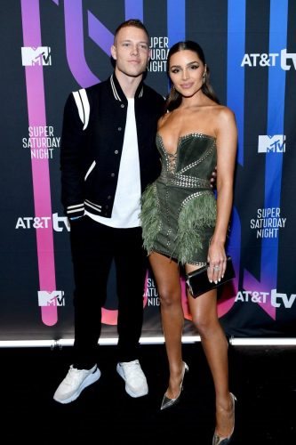 (L-R) Christian McCaffrey and Olivia Culpo attend AT&T TV Super Saturday Night at Meridian at Island Gardens on February 01, 2020 in Miami, Florida.